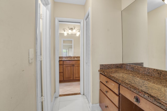 100 SW 15th Ct, Boca Raton, FL 33486 - bathroom with tile patterned floors and vanity