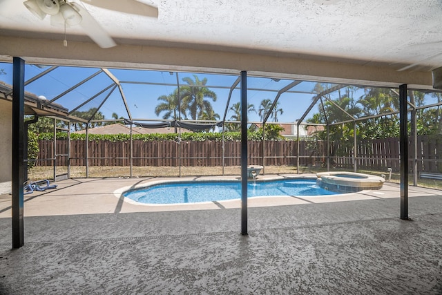 100 SW 15th Ct, Boca Raton, FL 33486 - view of pool featuring a pool with connected hot tub, a patio area, a fenced backyard, a lanai, and ceiling fan