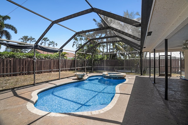 100 SW 15th Ct, Boca Raton, FL 33486 - view of swimming pool featuring a fenced backyard, a pool with connected hot tub, glass enclosure, and a patio