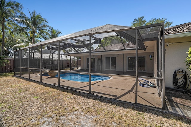 100 SW 15th Ct, Boca Raton, FL 33486 - view of pool with fence, a patio, glass enclosure, a fenced in pool, and ceiling fan