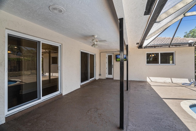 100 SW 15th Ct, Boca Raton, FL 33486 - view of patio featuring glass enclosure, visible vents, and a ceiling fan