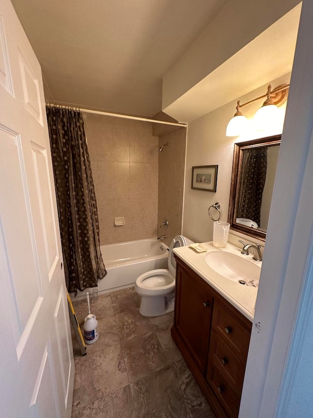 full bathroom with vanity, toilet, and shower / tub combo