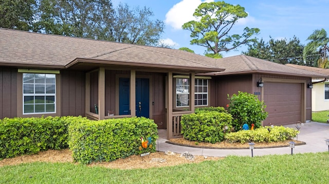 ranch-style home featuring a garage