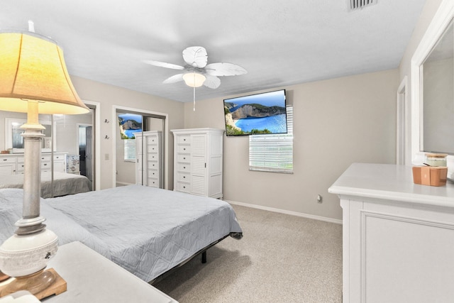 bedroom with ceiling fan, light colored carpet, and billiards