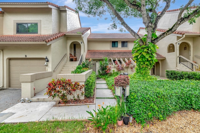 mediterranean / spanish-style house featuring a garage