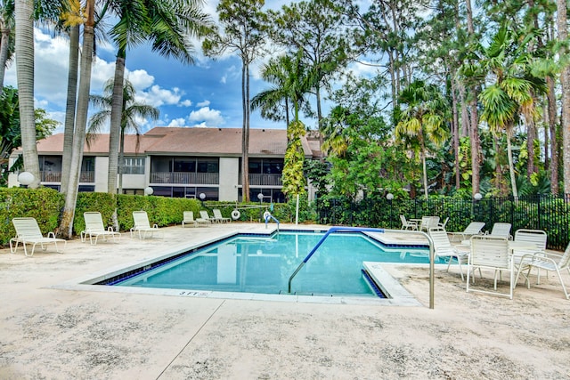 view of pool featuring a patio