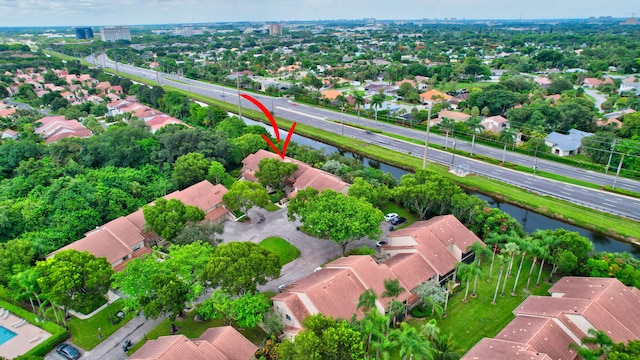 bird's eye view with a water view