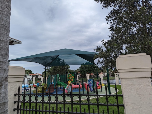 view of jungle gym featuring a yard