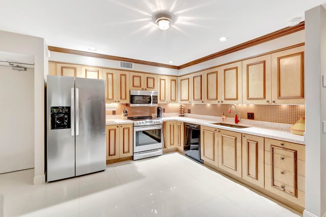 kitchen with light tile patterned flooring, decorative backsplash, stainless steel appliances, and sink