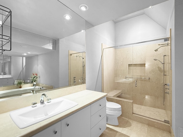 bathroom with tile patterned floors, vanity, toilet, and walk in shower