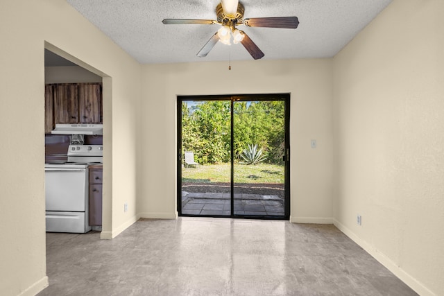 empty room featuring a textured ceiling and ceiling fan