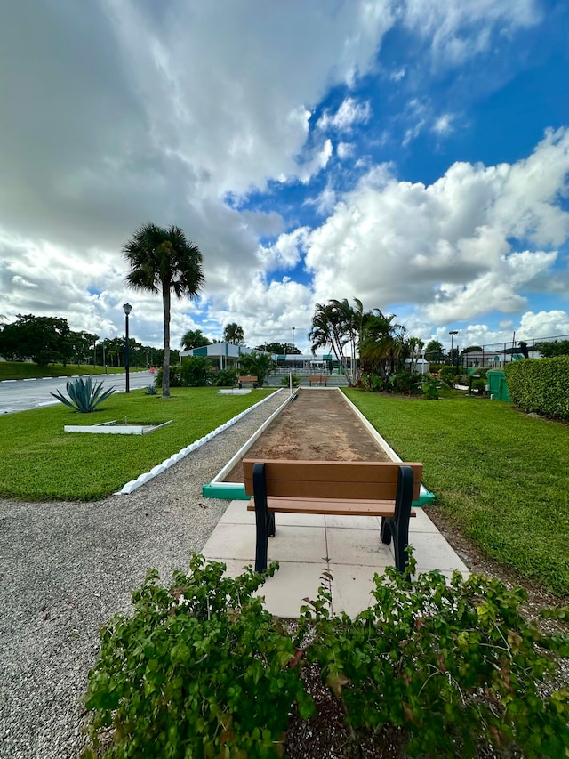 surrounding community featuring a lawn