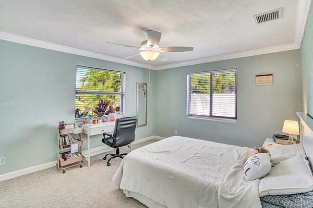 704 Eastwind Dr, North Palm Beach, FL 33408 - bedroom featuring crown molding, visible vents, and carpet floors