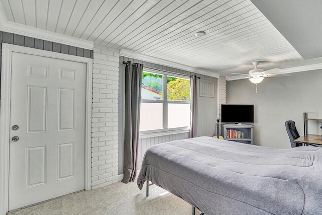 bedroom with ceiling fan, carpet flooring, and ornamental molding