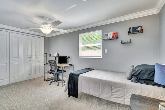 carpeted bedroom with crown molding and ceiling fan