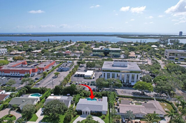 704 Eastwind Dr, North Palm Beach, FL 33408 - drone / aerial view with a water view