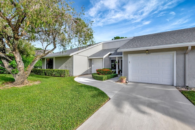 single story home featuring a garage and a front yard