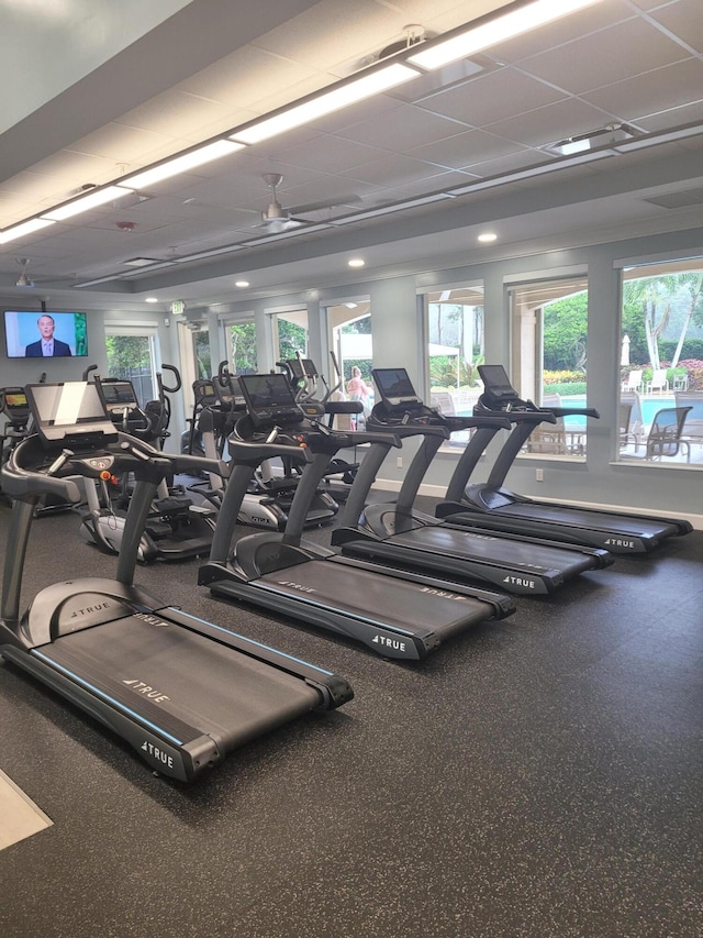 workout area with ceiling fan