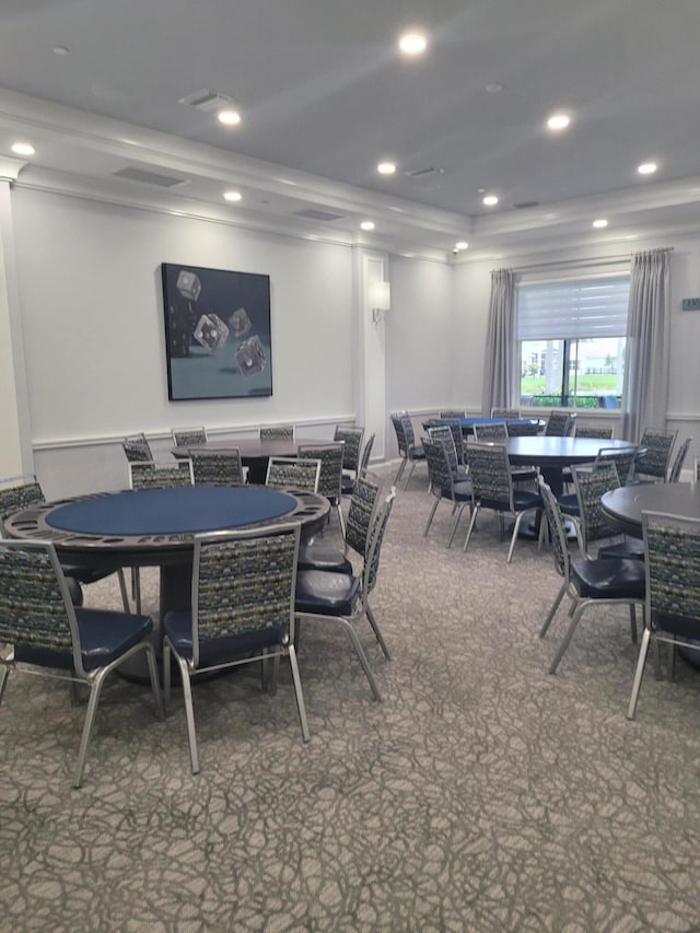 dining space featuring carpet