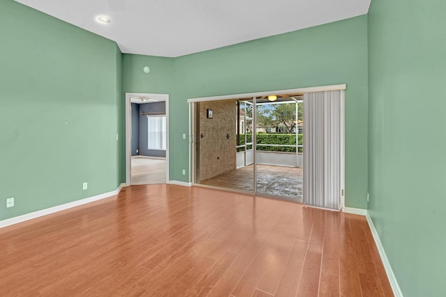 spare room with light hardwood / wood-style floors