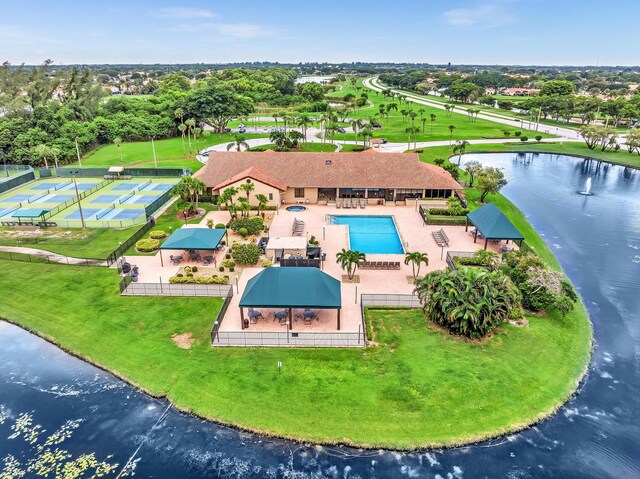 birds eye view of property featuring a water view