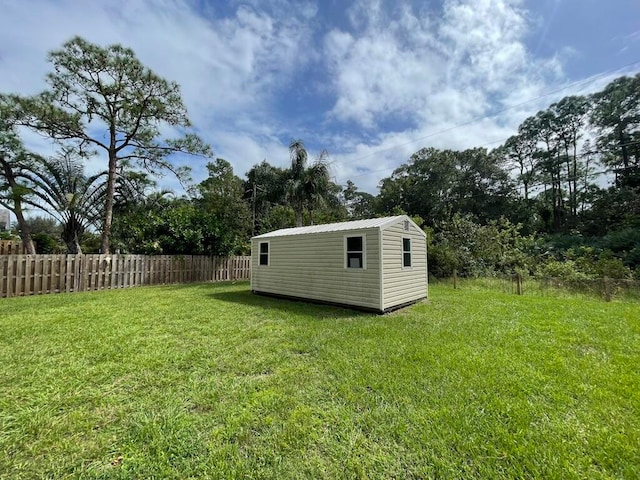 view of yard with a storage unit