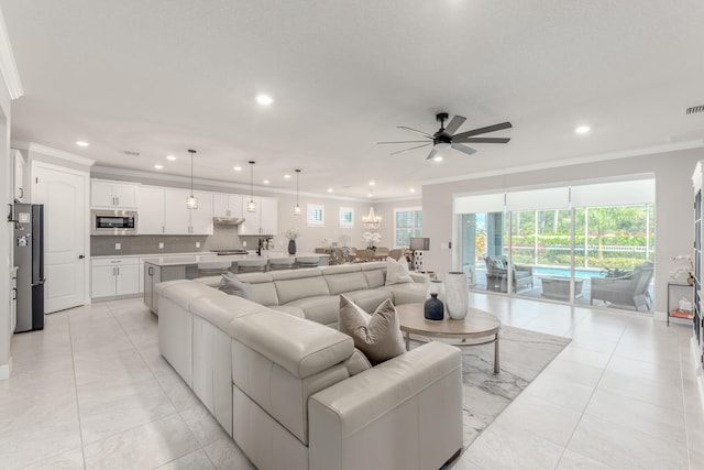 tiled living room featuring crown molding and ceiling fan