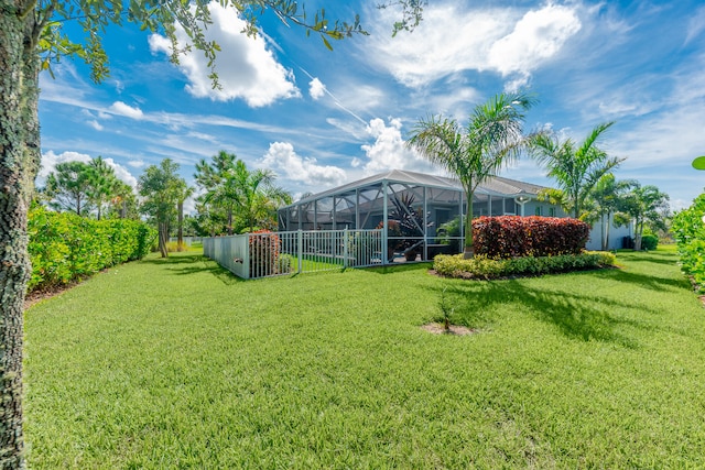 view of yard with a lanai