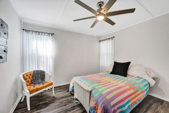 bedroom featuring ceiling fan and dark hardwood / wood-style flooring