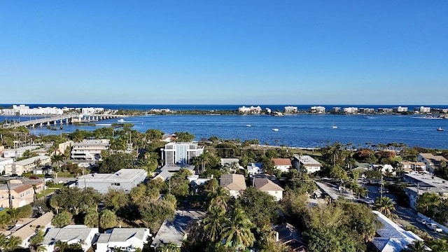 bird's eye view featuring a water view and a residential view