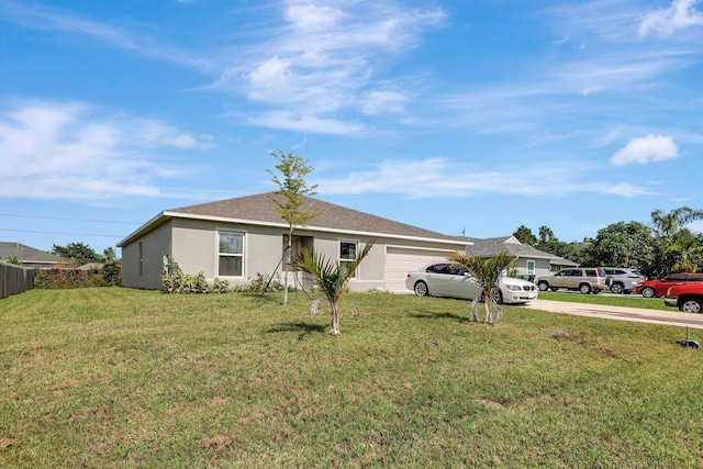 single story home featuring a front lawn and a garage