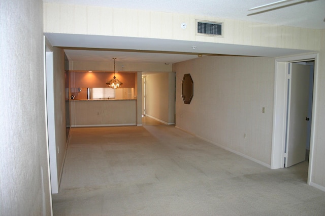 interior space featuring light colored carpet