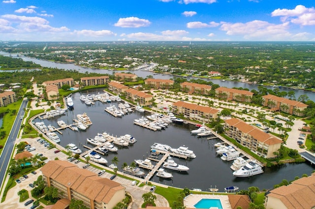 birds eye view of property featuring a water view