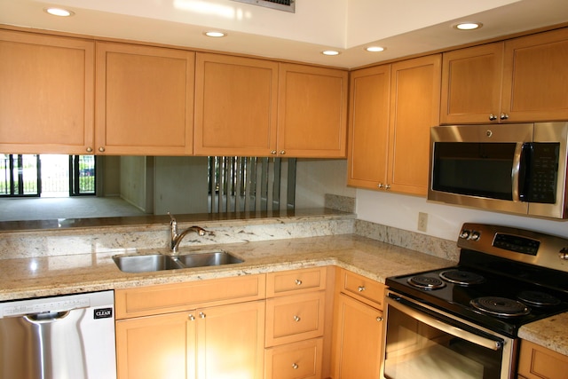 kitchen featuring sink and appliances with stainless steel finishes