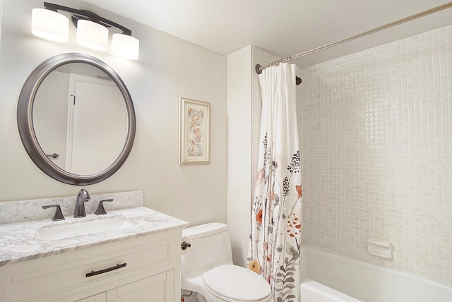 full bathroom featuring vanity, toilet, and shower / bath combination with curtain