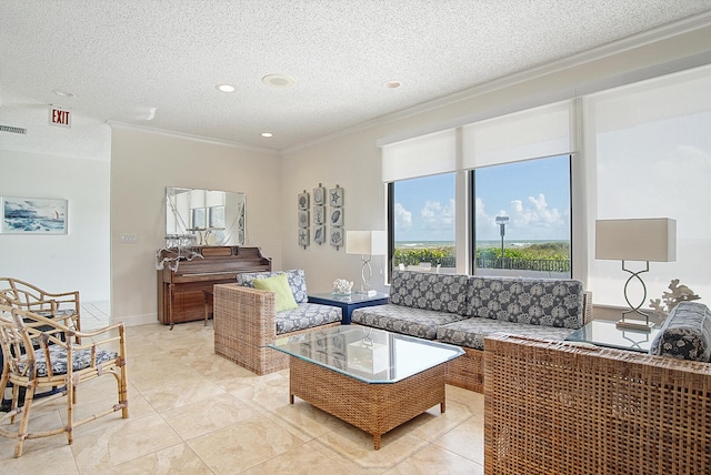 tiled living room featuring crown molding and a textured ceiling