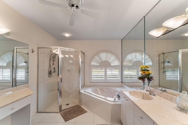 bathroom featuring vanity and separate shower and tub