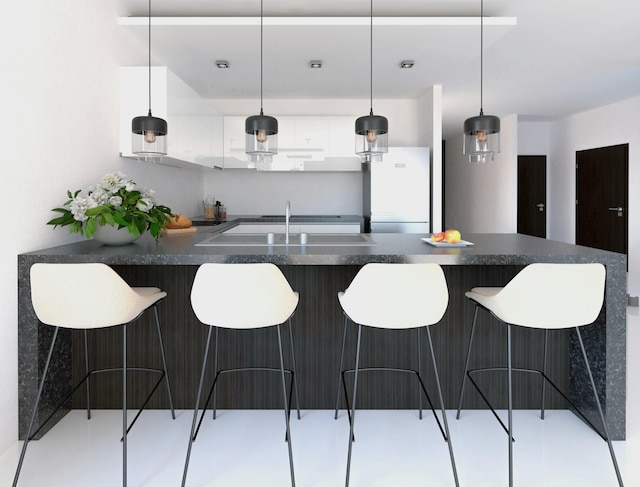 533 NW 16th Ave, Fort Lauderdale, FL 33311 - bar featuring pendant lighting and freestanding refrigerator