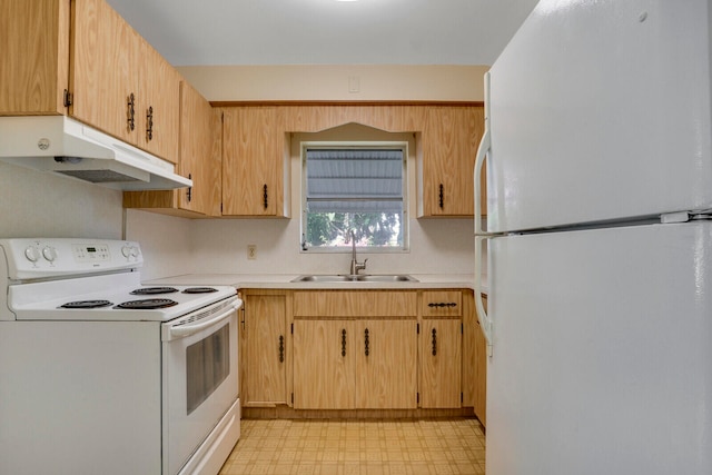 kitchen featuring white appliances, sink, and light brown cabinets