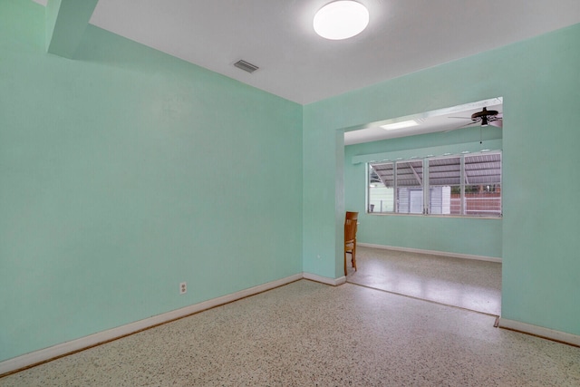 empty room with ceiling fan