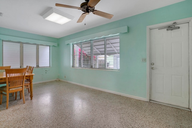 dining space featuring ceiling fan