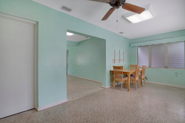 unfurnished dining area with ceiling fan