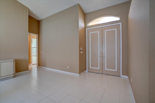 entrance foyer featuring light tile patterned floors