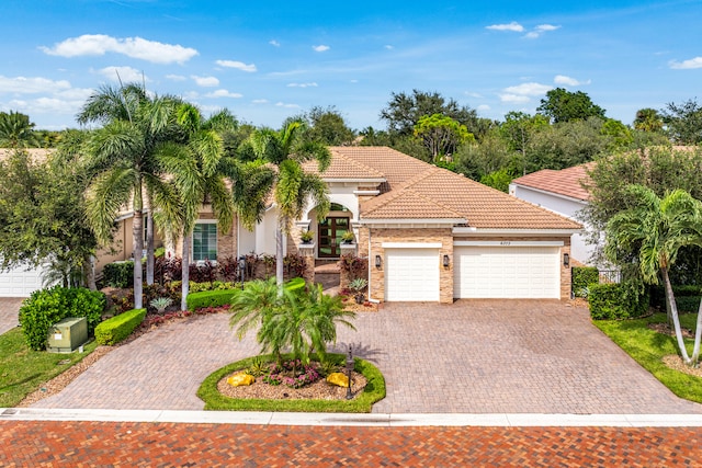 mediterranean / spanish-style house featuring a garage