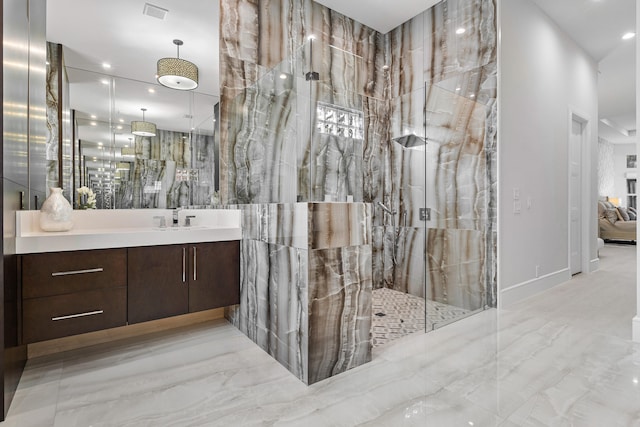 bathroom with vanity and walk in shower