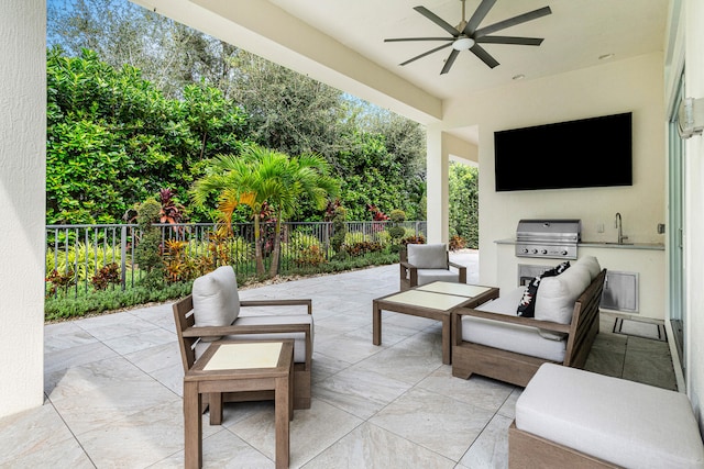 view of patio / terrace featuring sink, a grill, and ceiling fan