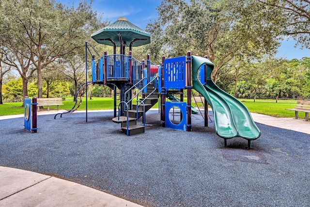 view of playground with a yard