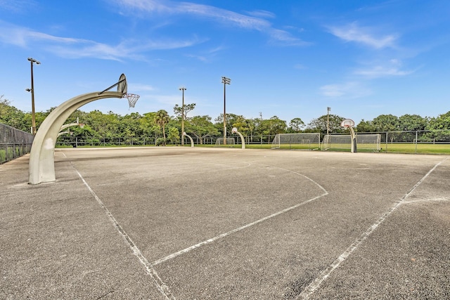 view of community featuring basketball court