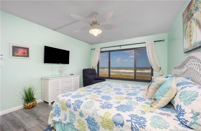 bedroom featuring wood-type flooring and ceiling fan