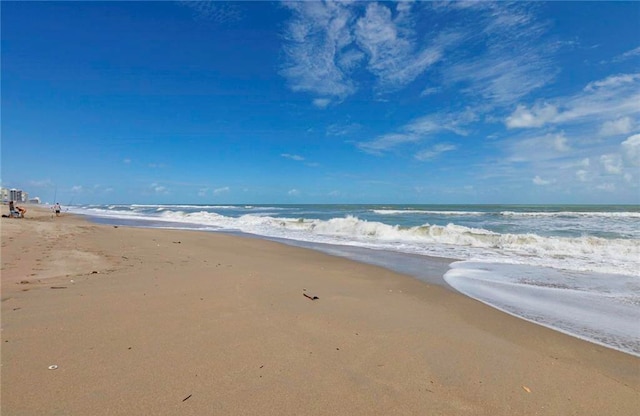 property view of water featuring a beach view